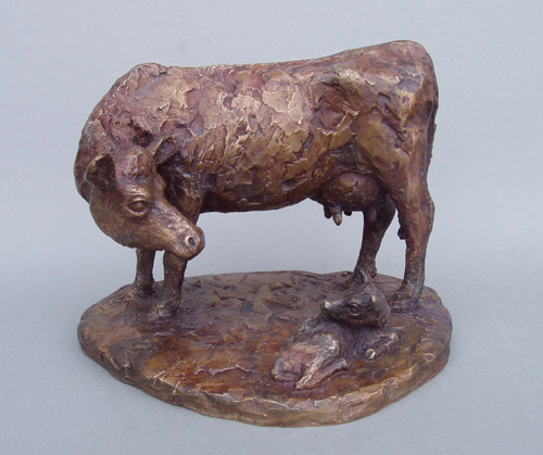a bronze sculpture of a cow with a new calf linking to a bigger image and information