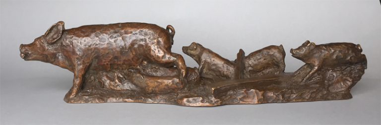 bronze sculpture of escaping pigs linking to an enlargement and information