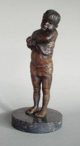 Bronze sculpture of small boy