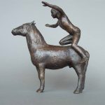 Bronze sculpture of a girl on pony linking to details