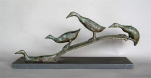 Bronze sculpture of duckling going to water on a slate base used as a link to details