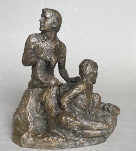 Bronze sculpture of boys ferreting