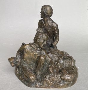 Bronze sculpture of boys ferreting