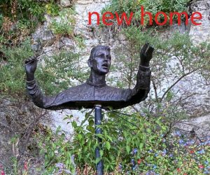 Sculpture of young conductor in new home